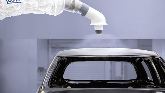 robot paint sprayer painting car roof